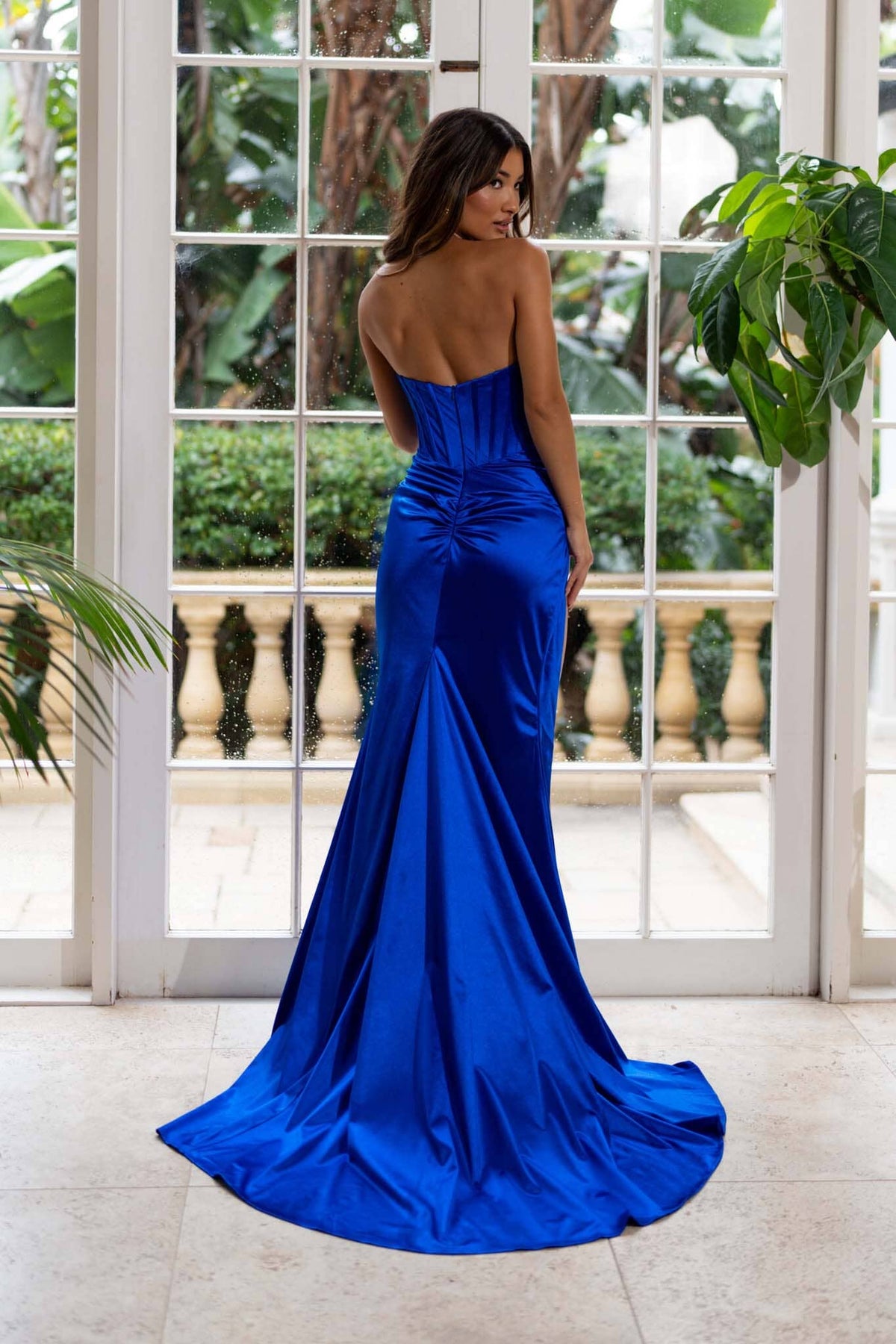 Back image of Royal Blue Strapless Fitted Evening Gown with Corset Style Bodice, Thigh High Side Slit and Sweep Train