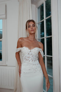 White Off The Shoulder Wedding Gown with Semi Sheer Corset Style Bodice, Sweetheart Off Shoulder Neckline with hand sewn Lace Appliques