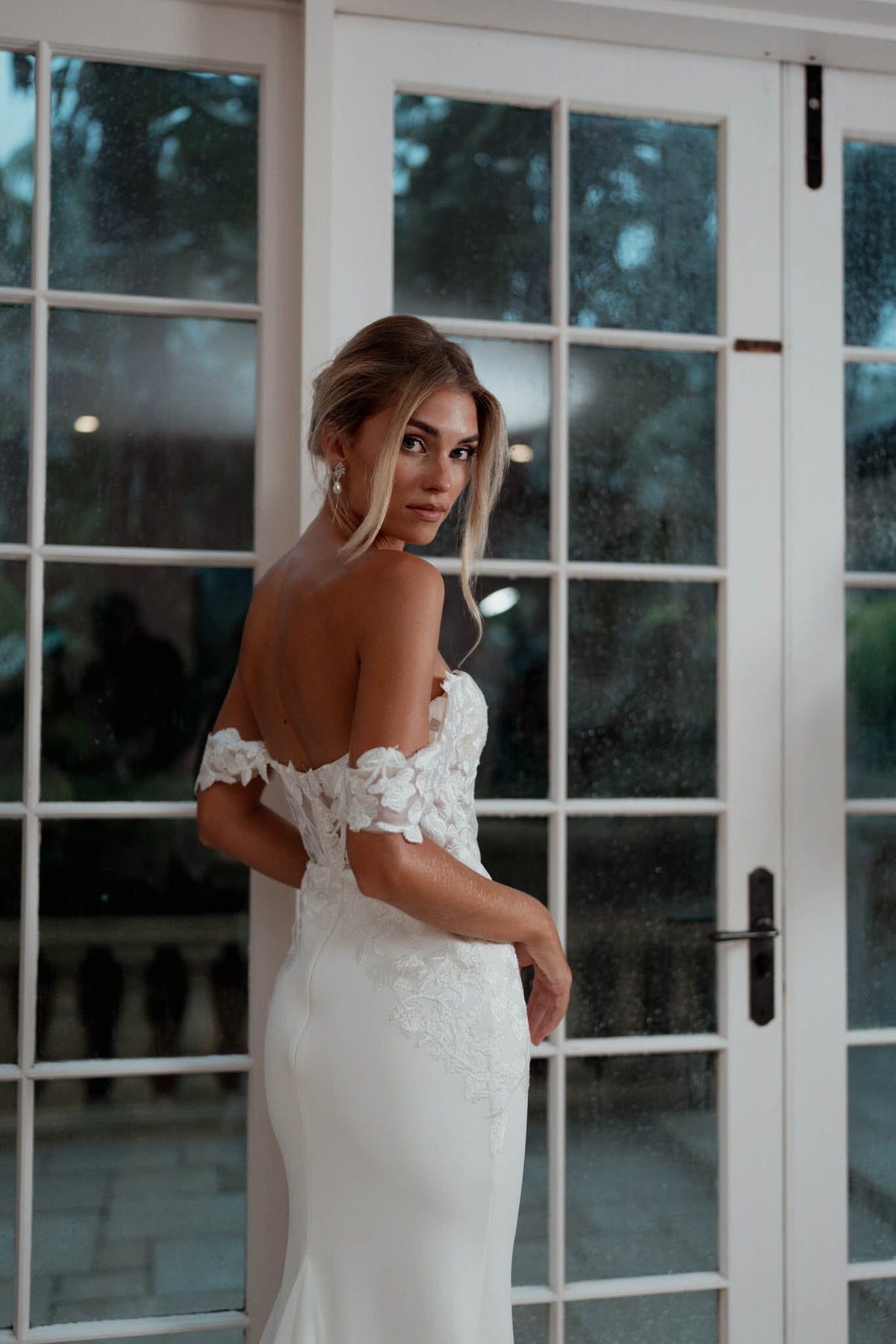 White Off The Shoulder Wedding Gown with Semi Sheer Corset Style Bodice, Sweetheart Off Shoulder Neckline with hand sewn Lace Appliques