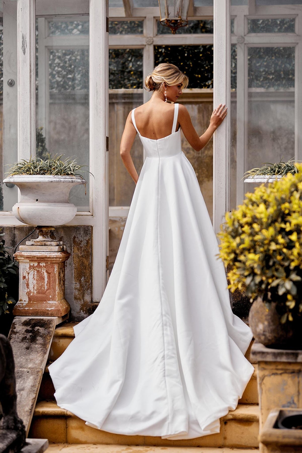 Back Image showing Half Open Back Design of A-line Satin Bridal Gown with Square Neckline and Shoulder Straps