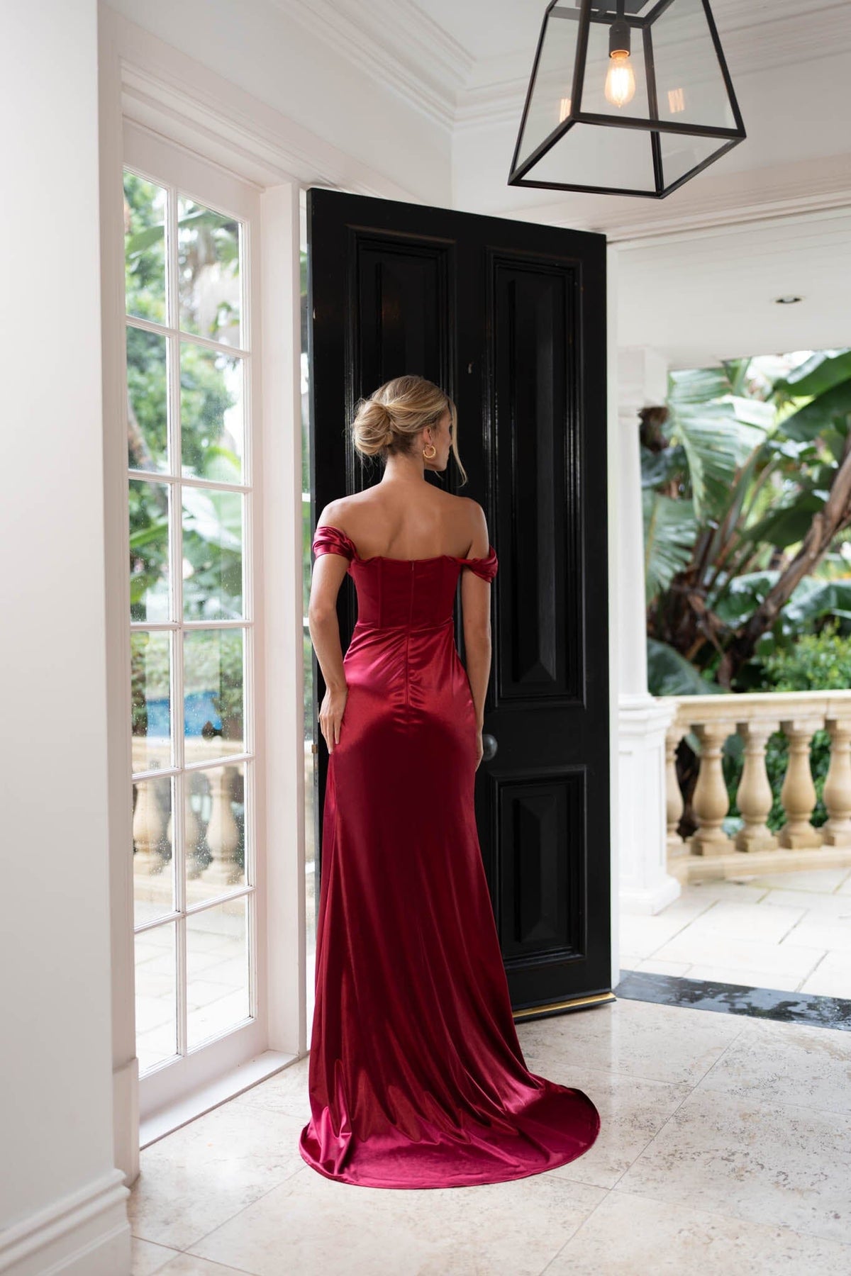 Back image of Deep Red Stretch Satin Formal Gown with Bustier Off-The-Shoulder Neckline, Gathered Detail and Thigh High Side Slit