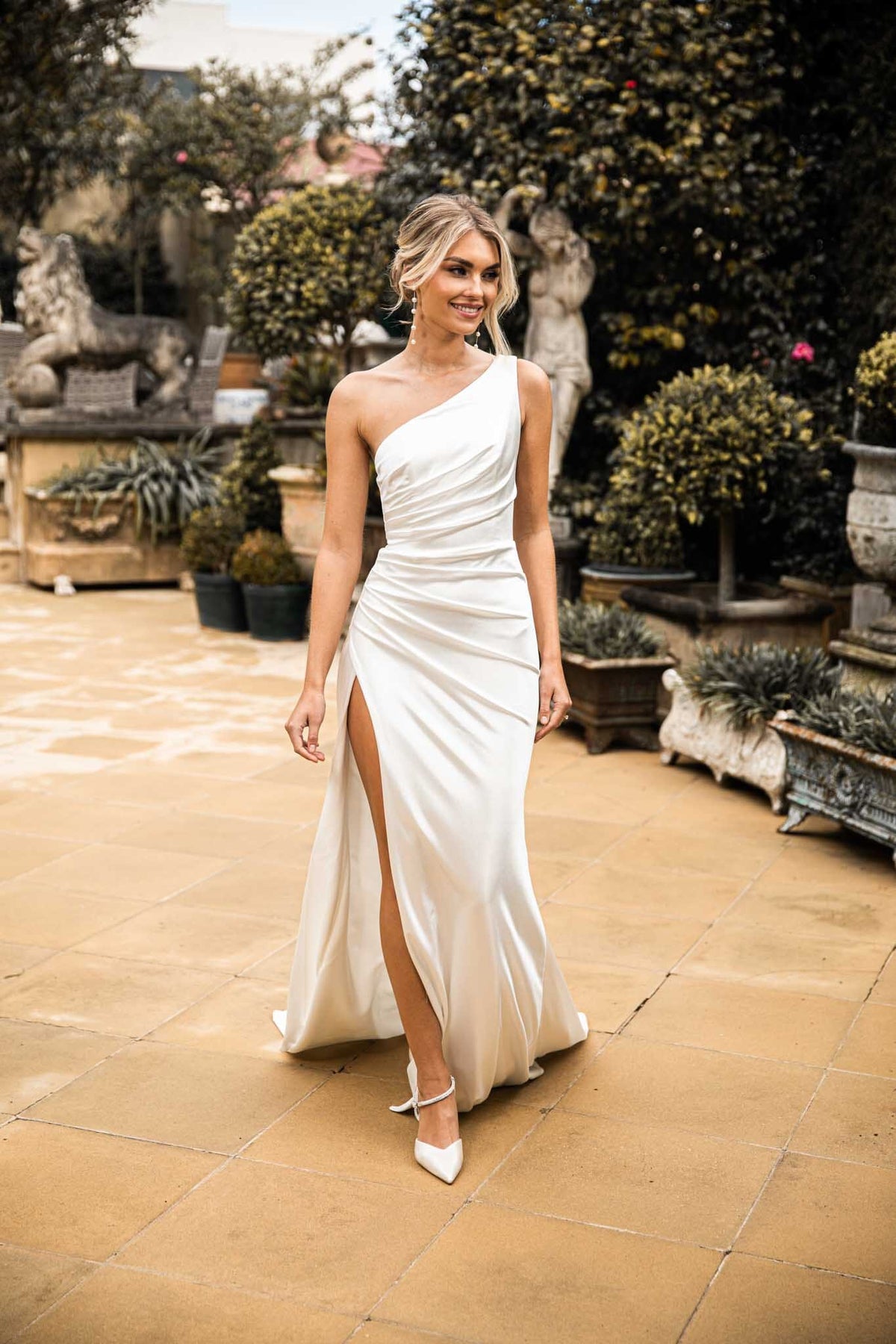 Ivory White High Shine Stretch Satin One Shoulder Long Evening Gown with Gathered Waist Detail and Thigh High Side Slit