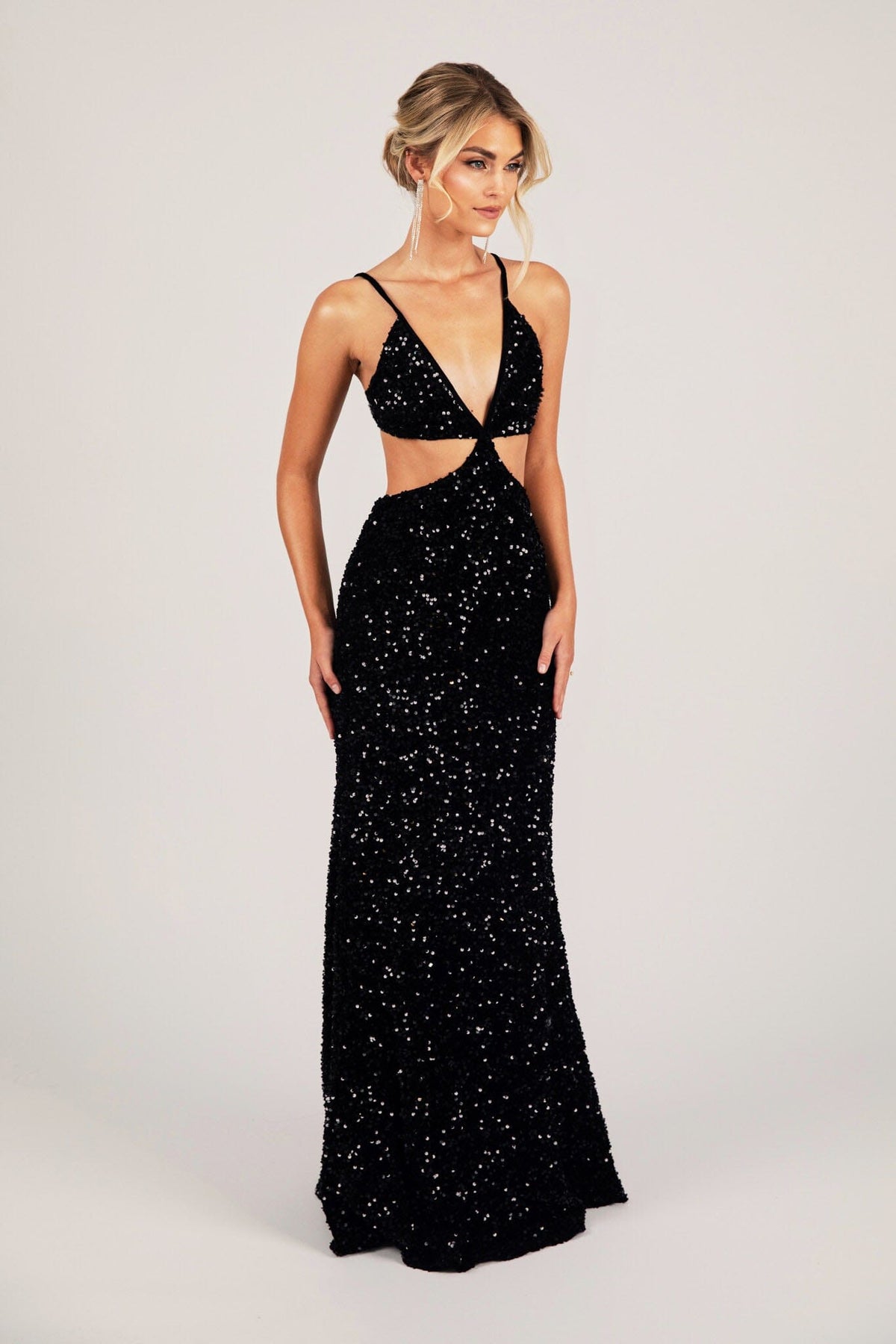 Side Image of Black Velvet Sequin Fitted Evening Long Gown with Thin Shoulder Straps, Side Cut Outs and Mermaid Full Length Skirt