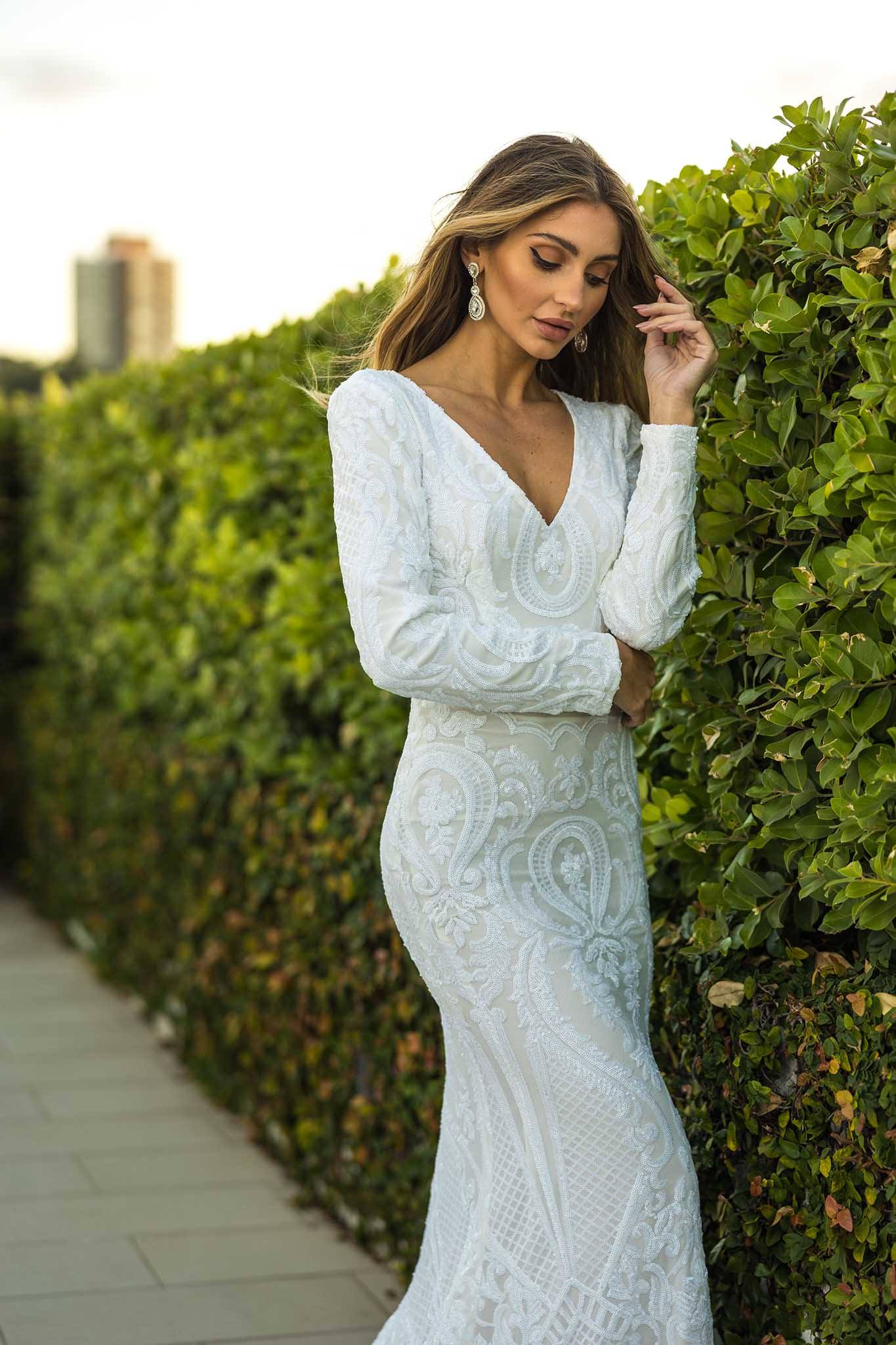 White long store sleeve sparkly dress