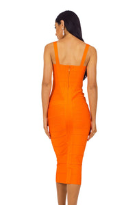 Back of orange colored midi bodycon bandage dress featuring sweetheart neckline and shoulder straps